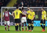 WATFORD, ENGLAND - FEBRUARY 25: Michail Antonio of West Ham United is shown a red card during the Premier League match between Watford and West Ham United at Vicarage Road on February 25, 2017 in Watford, England. (Photo by Matthew Lewis/Getty Images)