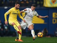 VILLARREAL, SPAIN - FEBRUARY 26: Adrian Lopez (L) of Villarreal competes for the ball with Pepe of Real Madrid during the La Liga match between Villarreal CF and Real Madrid at Estadio de la Ceramica on February 26, 2017 in Villarreal, Spain. (Photo by Fotopress/Getty Images)