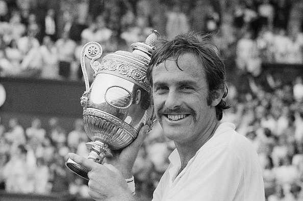 Australian tennis player John Newcombe wins the Men&#039;s Singles final at Wimbledon, after beating America&#039;s Stan Smith, London, 4th July 1971. (Photo by Reg Burkett/Daily Express/Getty Images)