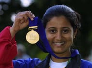 BISLEY - AUGUST 2: Anjali Bhagwat of India celebrates winning gold in the Women's 50m Rifle 3 Positions Singles Competition (her fourth gold of the Games) during the 2002 Commonwealth Games in Bisley, England on August 2, 2002. (Photo by Craig Prentis/Getty Images)
