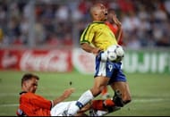 7 Jul 1998: Holland captain Frank de Boer brings down Ronaldo of Brazil during the World Cup semi-final at the Stade Velodrome in Marseille, France. Brazil went through on penalties. \ Mandatory Credit: Stu Forster /Allsport