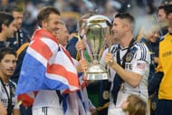 CARSON, CA - DECEMBER 01: David Beckham #23 and Robbie Keane #7 of Los Angeles Galaxy celebrate the 3-1 victory against the Houston Dynamo to win the 2012 MLS Cup at The Home Depot Center on December 1, 2012 in Carson, California. (Photo by Harry How/Getty Images)