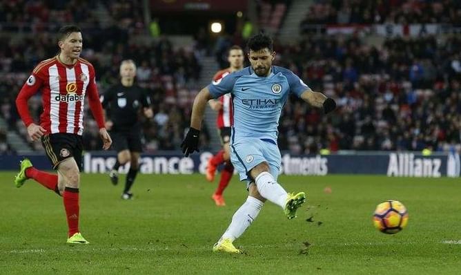 Man City ease past Sunderland to keep up title chase