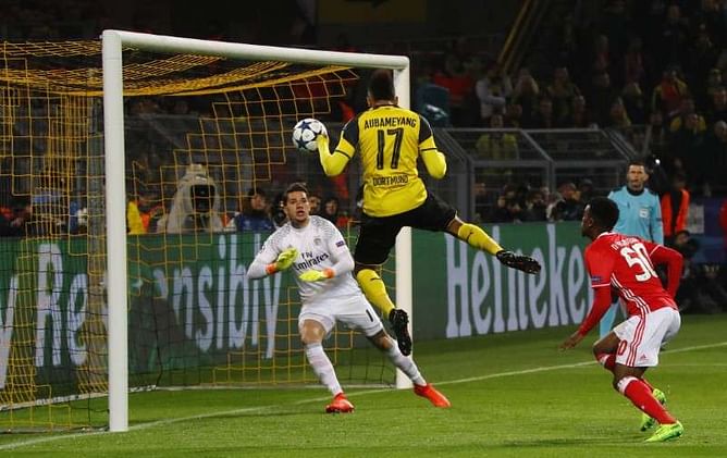 Aubameyang hat-trick leads Dortmund into last eight