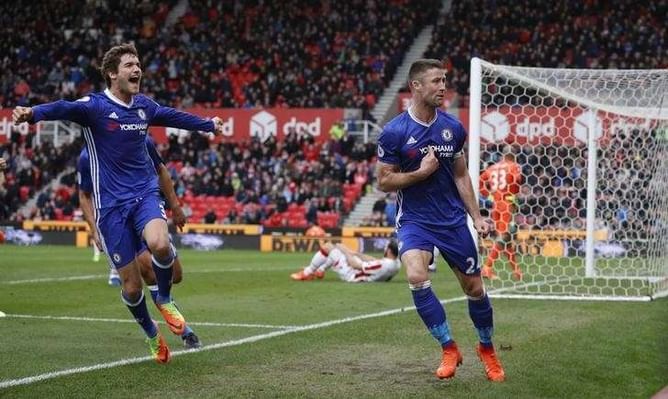 Chelsea 13 points clear after late Cahill winner at Stoke