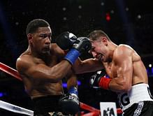 Golovkin edges Jacobs in rare decision to defend titles