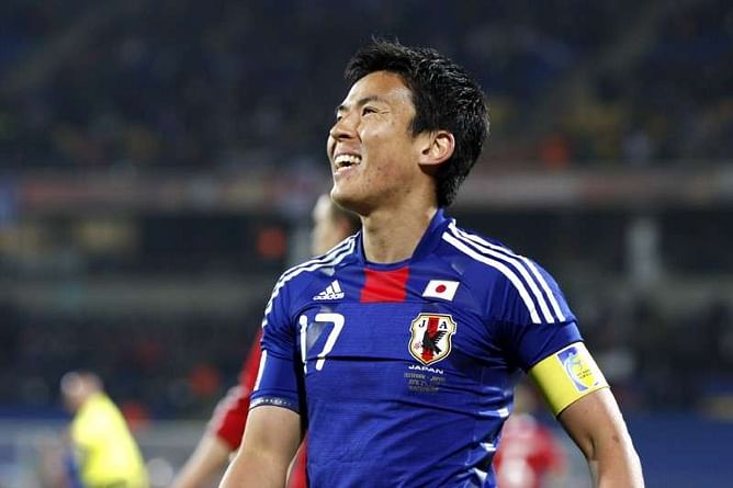 Soccer - Heartbroken captain Hasebe withdraws from Japan squad