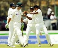 GALLE,SRI LANKA - MARCH 8: Upul Chandana of Sri Lanka celebrates the wicket of Ricky Ponting of Australia during day one of the First Test between Australia and Sri Lanka played at the Galle International Cricket Stadium on March 8, 2004 in Galle, Sri Lanka. (Photo by Hamish Blair/Getty Images)