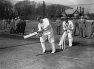 20th April 1950: West Indian cricketer G E Gomez (1919 - 1996) in the practice nets at Eastbourne, with team mate C L Walcott keeping the wicket. (Photo by Jimmy Sime/Central Press/Getty Images)