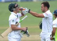 JOHANNESBURG, SOUTH AFRICA - DECEMBER 22: AB de Villiers and Faf du Plessis (R) of South Africa share a drink during day 5 of the 1st Test match between South Africa and India at Bidvest Wanderers Stadium on December 22, 2013 in Johannesburg, South Africa. (Photo by Duif du Toit/Gallo Images/Getty Images)