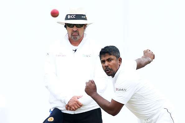 WELLINGTON, NEW ZEALAND - JANUARY 05:  Rangana Herath of Sri Lanka bowls during day three of the Second Test match between New Zealand and Sri Lanka at Basin Reserve on January 5, 2015 in Wellington, New Zealand.  (Photo by Hagen Hopkins/Getty Images)