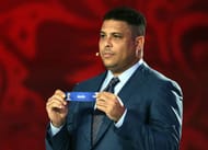 SAINT PETERSBURG, RUSSIA - JULY 25: Draw assistant Ronaldo holds up the name Brazil during the South American Zone draw at the Preliminary Draw of the 2018 FIFA World Cup in Russia at The Konstantin Palace on July 25, 2015 in Saint Petersburg, Russia. (Photo by Dennis Grombkowski/Getty Images)