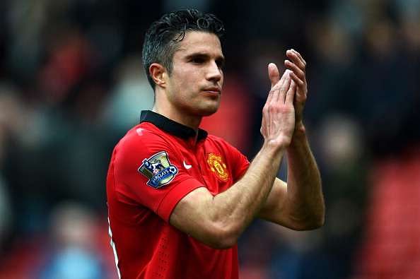 MANCHESTER, ENGLAND - MAY 03:  A dejected Robin van Persie of Manchester United applauds the home fans following his team&#039;s 1-0 defeat during the Barclays Premier League match between Manchester United and Sunderland at Old Trafford on May 3, 2014 in Manchester, England.  (Photo by Shaun Botterill/Getty Images)