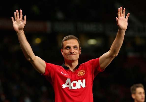 MANCHESTER, ENGLAND - MAY 06:  Nemanja Vidic of Manchester United salutes the fans after his final home game for the club at the end of the Barclays Premier League match between Manchester United and Hull City at Old Trafford on May 6, 2014 in Manchester, England.  (Photo by Alex Livesey/Getty Images)