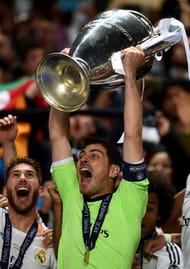 LISBON, PORTUGAL - MAY 24: Iker Casillas of Real Madrid lifts the Champions League trophy during the UEFA Champions League Final between Real Madrid and Atletico de Madrid at Estadio da Luz on May 24, 2014 in Lisbon, Portugal. (Photo by Laurence Griffiths/Getty Images)
