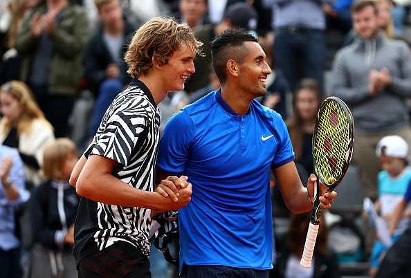 PARIS, FRANCE - MAY 26:  Alexander Zverev of Germany and Nick Kyrgios of Australia following their victory during the Men&#039;s Singles second round match against Pablo Carreno Busta and David Marrero of Spain on day five of the 2016 French Open at Roland Garros on May 26, 2016 in Paris, France.  (Photo by Julian Finney/Getty Images)