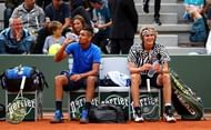 PARIS, FRANCE - MAY 26: Nick Kyrgios of Australia and Alexander Zverev of Germany take a break during the Men's Singles second round match against Pablo Carreno Busta and David Marrero of Spain on day five of the 2016 French Open at Roland Garros on May 26, 2016 in Paris, France. (Photo by Julian Finney/Getty Images)