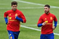 LA ROCHELLE, FRANCE - JUNE 14: Gerard Pique (L) and Sergio Ramos of Spain warm up during a training session on June 14, 2016 in La Rochelle, France. (Photo by David Ramos/Getty Images)