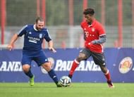 MUNICH, GERMANY - OCTOBER 12: Kingsley Coman (R) of FC Bayern Muenchen challenges Michael Oberli of the Paulaner Soccer Team during the Paulaner Fan Dream - Bavarian Battle Qualifier on October 12, 2016 in Munich, Germany. (Photo by Lennart Preiss/Getty Images For Paulaner)