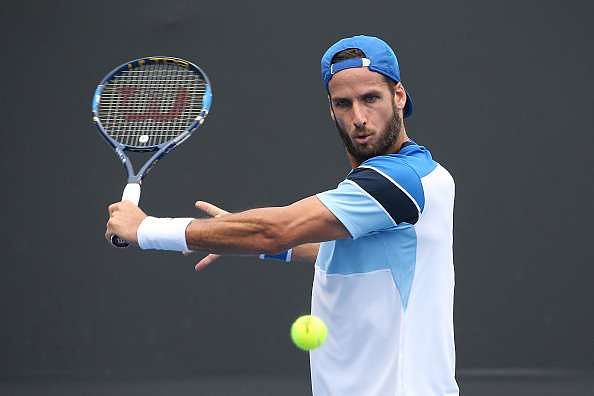 MELBOURNE, AUSTRALIA - JANUARY 17:  Feliciano Lopez of Spain plays a backhand in his first round match against Fabio Foginni of Italy on day two of the 2017 Australian Open at Melbourne Park on January 17, 2017 in Melbourne, Australia.  (Photo by Pat Scala/Getty Images)