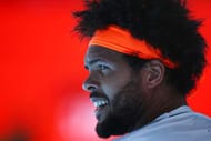MELBOURNE, AUSTRALIA - JANUARY 24: Jo-Wilfried Tsonga of France looks on between games in his quarterfinal match against Stan Wawrinka of Switzerland on day nine of the 2017 Australian Open at Melbourne Park on January 24, 2017 in Melbourne, Australia. (Photo by Clive Brunskill/Getty Images)