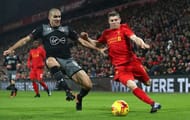 LIVERPOOL, ENGLAND - JANUARY 25: Oriol Romeu of Southampton makes a challenge on James Milner of Liverpool during the EFL Cup Semi-Final Second Leg match between Liverpool and Southampton at Anfield on January 25, 2017 in Liverpool, England. (Photo by Julian Finney/Getty Images)