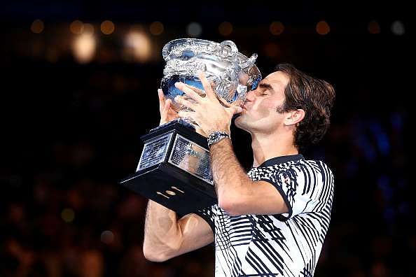 MELBOURNE, AUSTRALIA - JANUARY 29:  Roger Federer of Switzerland kisses the Norman Brookes Challenge Cup after winning the Men&#039;s Final match against Rafael Nadal of Spain on day 14 of the 2017 Australian Open at Melbourne Park on January 29, 2017 in Melbourne, Australia.  (Photo by Cameron Spencer/Getty Images)