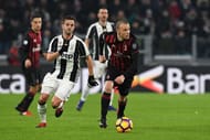 TURIN, ITALY - JANUARY 25: Luca Antonelli (R) of AC Milan in action against Miralem Pjanic of Juventus FC during the TIM Cup match between Juventus FC and AC Milan at Juventus Stadium on January 25, 2017 in Turin, Italy. (Photo by Valerio Pennicino/Getty Images)
