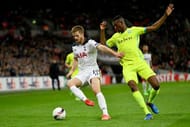 LONDON, ENGLAND - FEBRUARY 23: Eric Dier of Tottenham Hotspur holds off Kalifa Coulibaly of Gent during the UEFA Europa League Round of 32 second leg match between Tottenham Hotspur and KAA Gent at Wembley Stadium on February 23, 2017 in London, United Kingdom. (Photo by Dan Mullan/Getty Images)
