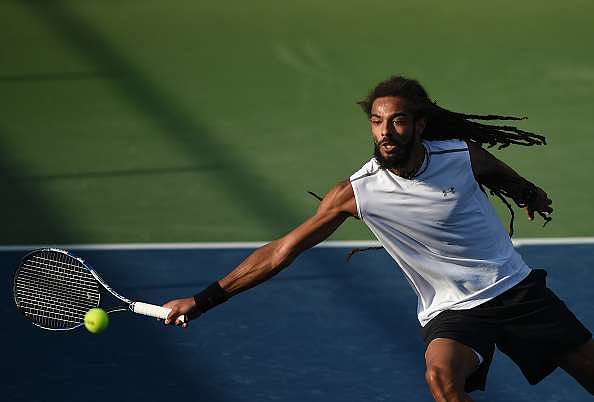 DUBAI, UNITED ARAB EMIRATES - FEBRUARY 28: Dustin Brown of Germany plays a forehand during his match against Daniel Evans of United Kingdom on day three of the ATP Dubai Duty Free Tennis Championship on February 28, 2017 in Dubai, United Arab Emirates.  (Photo by Tom Dulat/Getty Images)