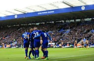 LEICESTER, ENGLAND - MARCH 04: Christian Fuchs of Leicester City (L) celebrates scoring his sides first goal with his Leicester City team mates during the Premier League match between Leicester City and Hull City at The King Power Stadium on March 4, 2017 in Leicester, England. (Photo by Stephen Pond/Getty Images)