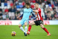 SUNDERLAND, ENGLAND - MARCH 05: David Silva of Manchester City (L) is put under pressure from Sebastian Larsson of Sunderland (R) during the Premier League match between Sunderland and Manchester City at Stadium of Light on March 5, 2017 in Sunderland, England. (Photo by Alex Livesey/Getty Images)