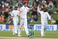 DUNEDIN, NEW ZEALAND - MARCH 10: Morne Morkel (L) and Temba Bavuma of South Africa celebrate the dismissal of Mitchell Santner of New Zealand during day three of the First Test match between New Zealand and South Africa at University Oval on March 10, 2017 in Dunedin, New Zealand. (Photo by Dianne Manson/Getty Images)