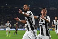 TURIN, ITALY - MARCH 10: Medhi Benatia (L) of Juventus FC celebrates after scoring the opening goal with team mate Paulo Dybala during the Serie A match between Juventus FC and AC Milan at Juventus Stadium on March 10, 2017 in Turin, Italy. (Photo by Valerio Pennicino/Getty Images)