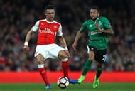 LONDON, ENGLAND - MARCH 11: Kieran Gibbs of Arsenal beats Nathan Arnold of Lincoln City to the ball during The Emirates FA Cup Quarter-Final match between Arsenal and Lincoln City at Emirates Stadium on March 11, 2017 in London, England. (Photo by Ian Walton/Getty Images)