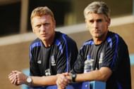 PRESTON, UNITED KINGDOM - JULY 19: Alan Irvine (right) the coach of Everton looks on with manager David Moyes (left) during the friendly match between Preston North End and Everton at Deepdale on July 19,2006 in Preston,England. (Photo by Michael Steele/Getty Images)