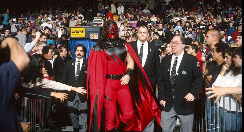 Ironically, the security guard kinda looks like unmasked Kane