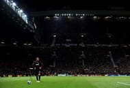 MANCHESTER, ENGLAND - MARCH 10: David Beckham of AC Milan prepares to take a free kick during the UEFA Champions League First Knockout Round, second leg match between Manchester United and AC Milan at Old Trafford on March 10, 2010 in Manchester, England. (Photo by Laurence Griffiths/Getty Images)
