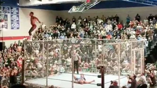 Video: Cody Rhodes attempts a moonsault off the top of the steel cage