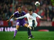 SEVILLE, SPAIN - JANUARY 12: Danilo of Real Madrid CF (L) competes for the ball with Sergio Escudero of Sevilla FC (R) during the Copa del Rey Round of 16 Second Leg match between Sevilla FC vs Real Madrid CF at Ramon Sanchez Pizjuan stadium on January 12, 2017 in Seville, Spain. (Photo by Aitor Alcalde/Getty Images)