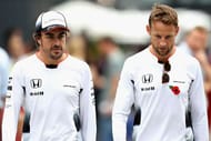 SAO PAULO, BRAZIL - NOVEMBER 11: Fernando Alonso of Spain and McLaren Honda and Jenson Button of Great Britain and McLaren Honda walk in the Paddock during practice for the Formula One Grand Prix of Brazil at Autodromo Jose Carlos Pace on November 11, 2016 in Sao Paulo, Brazil. (Photo by Mark Thompson/Getty Images)