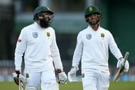 WELLINGTON, NEW ZEALAND - MARCH 18: Hashim Amla and JP Duminy of South Africa celebrate the win during day three of the test match between New Zealand and South Africa at Basin Reserve on March 18, 2017 in Wellington, New Zealand. (Photo by Hagen Hopkins/Getty Images)