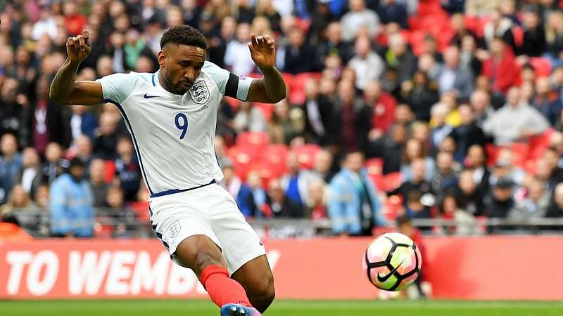 Emotional Defoe back in the goals for England