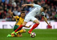 LONDON, ENGLAND - MARCH 26: John Stones of England is tackled by Nerijus Valskis of Lithuania during the FIFA 2018 World Cup Qualifier between England and Lithuania at Wembley Stadium on March 26, 2017 in London, England. (Photo by Laurence Griffiths/Getty Images)