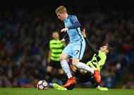 MANCHESTER, ENGLAND - MARCH 01: Kevin De Bruyne of Manchester City holds off Jon Gorenc Stankovic of Huddersfield Town during The Emirates FA Cup Fifth Round Replay match between Manchester City and Huddersfield Town at Etihad Stadium on March 1, 2017 in Manchester, England. (Photo by Clive Brunskill/Getty Images)