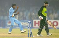 LAHORE, PAKISTAN - MARCH 24 : Lakshmipathy Balaji (L) of India celebrates after bowling Moin Khan of Pakistan to win the match during the fifth Pakistan v India one-day international match played at the Gadaffi Stadium on March 24, 2004 in Lahore, Pakistan. India won the match by 40 runs to win the series 3-2. (Photo by Scott Barbour/Getty Images)