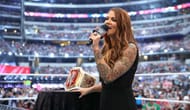 Lita presenting the new Raw Women's Championship at Wrestlemania 32
