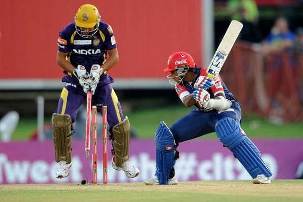 PRETORIA, SOUTH AFRCA - OCTOBER 13:  Mahela Jayawardene of the Daredevils is bowled by Sunil Narine (not pictured) as wicketkeeper Manvinder Bisla (L) of the Knight Riders reacts during the Karbonn Smart CLT20 Group A match between Kolkata Knight Riders (IPL) and Delhi Daredevils (IPL) at SuperSport Park on October 13, 2012 in Pretoria, South Africa.  (Photo by Lee Warren/Gallo Images/Getty Images)