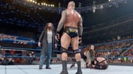 Randy Orton in the ring with Luke Harper
