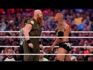 Eric Rowan and The Rock at WrestleMania 32